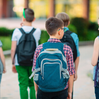 Group of kids going to school together.